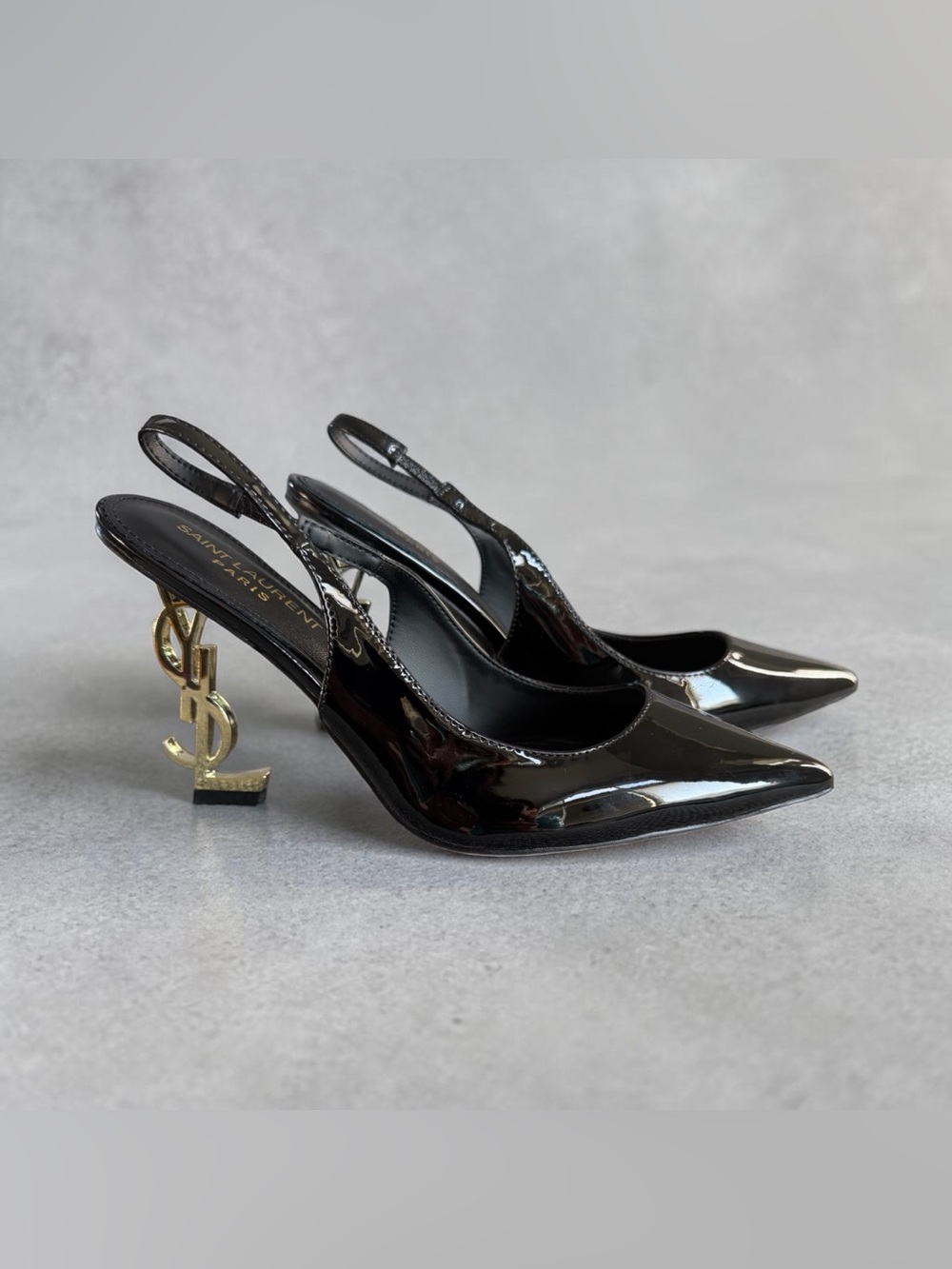 Saint Laurent Black Patent Leather Slingback Pumps with Gold YSL Heel